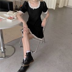 Description: An elegant black vintage gothic dress with white ruffles will be a great choice for a summer outfit, a versatile dress for both walks and stylish photo shoots on your Instagram. Material: Cotton Polyester S: Shoulder - 34cm/ Bust - 84cm/ Length - 79cm/ Sleeve - 26cm M: Shoulder - 35cm/ Bust - 86cm/ Length - 80cm/ Sleeve - 27cm L: Shoulder - 36cm/ Bust - 88cm/ Length - 81cm/ Sleeve - 28cm XL: Shoulder - 37cm/ Bust - 90cm/ Length - 82cm/ Sleeve - 29cm 2XL: Shoulder - 38cm/ Bust - 92cm Fitted Vintage Dress With Ruffles For Cosplay, Black Ruffled Mini Dress For Cosplay, Black Gothic Mini Dress With Lace Trim, Gothic Mini Dress With Ruffles And Short Sleeves, Black Summer Cosplay Dress, Black Mini Dress For Cosplay In Summer, Black Mini Dress For Summer Cosplay, Gothic Short Sleeve Dress With Lace Trim, Fitted Black Vintage Dress With Lace Trim