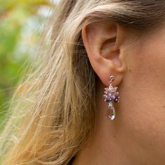 "These pink amethyst earrings are a subtle mix of colours that you will love to wear. In this pair, I have topped AAA-quality pink amethyst stones with a cluster of  tiny gemstones. The pear-shaped stones are beautifully faceted for lots of sparkle, and they are wrapped securely with sterling silver wire for an artisan look. The tight cluster of smaller stones include dark purple amethyst and several shades of spinel. The lavender and purple shades are beautiful with the bright silver. Sterling Purple Crystal Earrings For Wedding, Formal Lavender Earrings, Purple Bridal Earrings With Matching Set, Delicate Purple Wedding Earrings, Delicate Purple Earrings For Wedding, Lavender Gemstone Earrings, Elegant Lavender Earrings With Gemstone Accents, Elegant Lavender Drop Earrings, Elegant Lavender Dangle Crystal Earrings