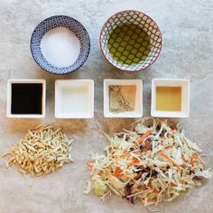 four bowls filled with different types of food on top of a white countertop next to each other