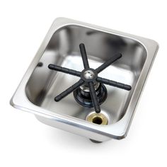 a stainless steel stove top with four burners