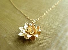 Gold Lotus Necklace ... symbolic flower pendant on a dainty gold filled chain on Etsy, $23.00 Yellow Gold Charm Necklace With Flower For Wedding, Delicate 14k Gold-filled Jewelry With Flower Charm, Delicate 14k Gold Filled Jewelry With Flower Charm, Gold Flower Pendant Jewelry For Wedding, Gold Flower Pendant Charm Necklace In 14k, Gold Brass Jewelry In Flower Shape, Gold Plated Charm Necklaces With Flower Pendant, Delicate Gold Charm Necklaces In Brass, Delicate Gold Charm Necklace With Flower Design