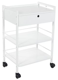 a white baby changing table on wheels