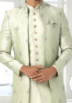 Readymade Art Silk Sherwani, and Jacket. Art Dupion Aligarhi Ready Made Trouser. Resham, Sequences, and Zari Work. Crafted in Chinese Collar Neck, and Full Sleeve. Faux Satin Lining with Plain Work. High-Quality Matching Buttons. Please Note: The footwear shown in the picture is for presentation and photography purpose only. Color: There might be slight color variation due to lightings and flashes while photo shooting. The color may also vary because of different screen resolutions. Wash Care: D Dress Modification, Western Party Wear, Suit With Jacket, Indo Western Sherwani, Wedding Kurta For Men, Jacket Art, Indian Groom Wear, Sherwani For Men, Western Party