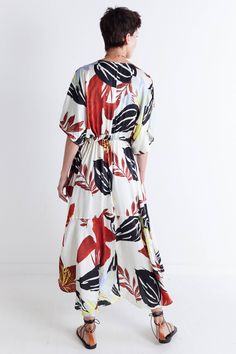 Say hello to sunny days with this one-of-a-kind dress, featuring a vibrant floral print and classic maxi silhouette. Style it heels or flats to dress up the look, or keep it more relaxed with sneakers or sandals. V-neckline Tie waist for adjustability Maxi length Side pockets *This item features an oversized fit. We recommend taking one size down in this style if a closer fit is preferred. Summer Floral Print Multicolor Maxi Dress, Summer Multicolor Floral Print Maxi Dress, Multicolor Floral Print Maxi Dress For Summer, Multicolor Floral Print Maxi Dress, Spring Red Maxi Dress With Abstract Print, Red Maxi Dress With Abstract Print For Spring, Tropical Red Floral Print Maxi Dress, Tropical Red Maxi Dress With Floral Print, Printed Maxi Dress For Spring Day Out