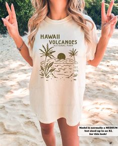 This trendy Hawaii beach shirt is the perfect cover up for warm summer days! Made from Comfort Colors fabric, it features a fun coconut girl and palm tree print that is sure to make any surfer girl happy. ⭐️ * I T E M * I N F O* ✦ Comfort Colors Unisex Shirt ✦ 100% Ring-Spun Cotton ✦ Printed using Direct To Garment style- Inks are printed directly into the fabric. ✦ Different sizing may effect placement of final design. ✦ Colors may differ slightly due to different user monitor and screen settin Oversized T-shirt For Beach In Summer, Hawaiian Camp Shirt With Graphic Print For Vacation, Casual Camp Shirt For Beach Vacation, Casual Beach Vacation Camp Shirt, Vacation Hawaiian Shirt For Beach Season, White Tropical Camp Shirt For Vacation, White Hawaiian Shirt For The Beach, Hawaiian Shirt For Beach Season Vacation, Hawaiian Shirt For Beach Vacation