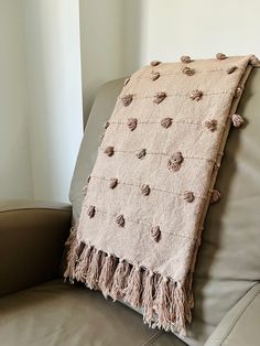 a blanket on the back of a couch