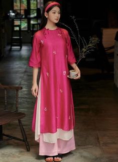 *Vietnamese traditional dress "ao dai" *Material: Silk *Design: Short-sleeved shirt embroidered with flowers and decorated with 4 sequins 📌 Made in Vietnam 📌 Shipping from Vietnam 📌 Take about 3 days to sew, and 2 weeks for shipping from Vietnam * weekday* Traditional Tunic With Traditional Drape For Festive Season, Spring Festive Kurta With Set-in Sleeves, Traditional Festive Dresses With Set-in Sleeves, Traditional Spring Kurta With Set-in Sleeves, Traditional Pink Tunic Sets, Traditional Pink Tunic For Festive Occasions, Traditional Fitted Ao Dai For Festive Occasions, Straight Kurta With Set-in Sleeves For Spring, Traditional Embroidered Festive Cheongsam