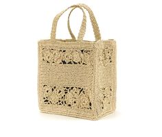 a crocheted shopping bag on a white background