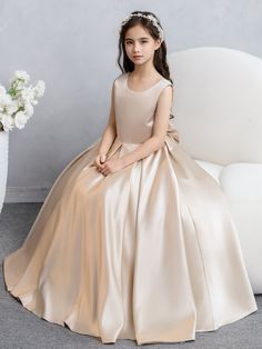 Fabric: Satin; Silhouette: A-Line/Princess; Neckline: Crew Neck; Hemline/Train: Floor-Length; Embellishment: Bowknot Sleeve: Sleeveless; Waist: Natural; Back Style: Zipper; Built-In Bra: No; Shown Color: Dusty Rose Special; Season: Spring;Summer;Fall;Winter; Satin Flower Girl Dresses, Flower Girl Dress With Bow, Flower Girl Dresses Champagne, Party Gown Dress, Satin Flower Girl Dress, Badgley Mischka Dress, First Communion Dresses, Party Dresses Online, Communion Dresses