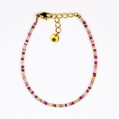 Take your jewelry game to the next level with our Dainty bracelet, featuring a playful combination of pink and gold seed beads. Add a touch of whimsy and elegance to any outfit with this unique piece. Materials: size 11/0 glass seed beads beading wire gold plated crimp beads gold plated wire guards gold plated lobster claw clasp gold plated extension chain gold plated logo charm Pink Tiny Beaded Bracelets For Party, Trendy Pink Bracelet With Faceted Beads, Gold Friendship Bracelets With Colorful Beads For Parties, Dainty Pink Beaded Bracelets For Party, Trendy Pink Spacer Beads, Dainty Pink Bracelets With Faceted Beads, Trendy Pink Beaded Chain Bracelets, Trendy Pink Beaded Chain Bracelet, Pink Gold Beaded Jewelry For Party