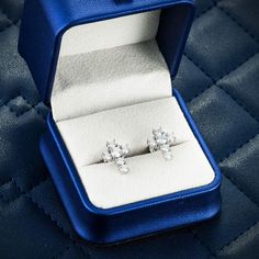 Exclusive 10MM Moissanite Cross Earrings 14K are now available, made of 925 sterling silver and PVD plated with 14K Gold. Both of these earrings measure exactly 10.63*13.69 millimeters in diameter and weigh exactly 2.3 grams each, with an estimated total diamond weight of 0.16 CTW. These men's moissanite earrings are iced out with round cut, colorless (D-Color), VVS moissanite flawless diamonds, placed in a prong and diamond setting. These stud earrings are made with a highly-durable stud screw Flawless Diamond, Vvs Diamond, Moissanite Earrings, Diamond Settings, Cross Earrings, Jewelry Case, Silver Diamonds, Custom Jewelry, Natural Diamonds