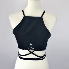 Black Suede Strappy Zip Up Racerback Crop Top Tank Condition: New Without Tags. No Rips Or Stains. Has No Brand Or Care Tags. Sizes: Small And Medium Made In China Approximate Measurements (Flat Lay): Size Small: Length: 9.5 In. Bust: 15.5 In. Size Medium: Length: 10 In. Bust: 17 In. Features: Zip Back Closure Halter Neckline Racerback Silhouette Suede Fabric Lined Convertible Straps On Hem For A Unique Style S: A217, 218, 219, 220, 221 M: A222, 223, 224 Black Halter Top With Built-in Bra For Spring, Black Tank Top With Built-in Bra And Strappy Back, Casual Crop Top With Built-in Bra And Strappy Back, Black Tops With Built-in Bra And Strappy Back, Black Top With Built-in Bra And Strappy Back, Black Top With Built-in Bra For Day Out, Chic Black Strappy Back Halter Top, Chic Black Halter Top With Strappy Back, Black Cropped Halter Top With Built-in Bra