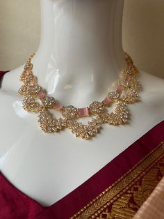 AD pink Doublet Designer Neckless Set/Gold finish/Small Neckless Gift Jewelry/South indian jewelry/Asian Jewelry/Pakisthani Jewelry This item is perfect for parties and festivals! DETAILS: Includes One Necklace and Two Earrings. Necklace: 18.0 inches. Adjustable length. Chain Closure. Weighs 1.55oz ( 45 g).  Earring:1.8 inch(es) long. Set weighs 0.60 oz (18g). Earring backs push on/off. Material: Imitation gold,  Ruby AD Stones GJ Finish. Finish: Premium gold with Dimond finish.  NOTE: I try my Pink Meenakari Temple Necklace Gift, Pink Temple Jewelry Necklace For Festive Occasions, Pink Temple Jewelry Necklace For Festivals, Pink Temple Necklace For Festive Occasions, Festive Pink Temple Necklace, Pink Festive Tikka, Pink Kundan Temple Necklace For Festivals, Pink Kundan Temple Necklace With Meenakari, Festive Kundan Necklace With American Diamond For Diwali