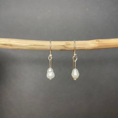 Natural white freshwater pearls. Approximately 7mm x 5mm. Exact pearls may vary but color is consistent. Ear wires are nickel free. June birthstone. Fresh Water Pearl, White Freshwater Pearl, June Birthstone, June Birth Stone, Ear Wires, Fresh Water, Freshwater Pearls, Jewelry Earrings Dangle, Etsy Earrings