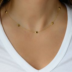 "Super cute and dainty star necklace. It's cute layered or alone. A total of 7 beautifully crafted stars adorn this necklace. -- D E T A I L S -- ▪︎ Made of 925 Sterling Silver ▪︎ Thick plating of 14k Gold or Rhodium ▪︎ Star charm measures 7mm, total of 7 ▪︎ 15\" + 3\" Extension Chain ▪︎ Nickel-free & Hypoallergenic Made with 100% Pure Love! Happy to answer any questions you may have!" Gold Star Necklace, Necklace Star, Star Necklace Gold, Star Charm Necklace, Star Pendant Necklace, Celestial Jewelry, Wedding Jewellery Necklace, Cute Necklace, Layering Necklace