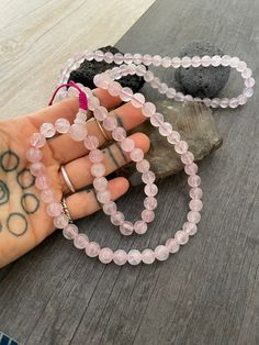 This rose quartz mala necklace has a light pink tone that will be easy to match your everyday outfits and keep you calm and grounded if you use it while meditating. Its a unique decor item also. A perfect gift for a yoga lover, or someone that loves stones. You can use it as a necklace or wrap it around the wrist and becomes a bracelet. The Mala necklace has a drop length of 43cm- 17 inch. A most have addition to your jewelry collection. ⚡️Join Akashi's VIP list for early bird discount access⚡️ Rose Quartz 108 Beads Jewelry For Meditation, Spiritual Pink Crystal Necklaces With Round Beads, Spiritual Rose Quartz Beaded Necklaces For Healing, Spiritual Healing Rose Quartz Beaded Necklaces, Pink Spiritual Crystal Necklace For Meditation, Spiritual Pink Crystal Necklaces For Healing, Spiritual Single Strand Pink Beaded Necklace, Adjustable Rose Quartz Round Bead Necklace, Spiritual Pink Single Strand Beaded Necklace