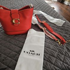 Brand New With Tag Paid $275+Tax For It.Has 2 Stripes.The Color Is Coral It's Good For Fall And Summe, It Comes With Dust Bag As Well. Designer Bucket Bag With Branded Hardware, Designer Satchel Bucket Bag With Branded Hardware, Designer Satchel Bucket Bag, Designer Rectangular Bucket Bag With Branded Hardware, Designer Bucket Bag With Detachable Strap For Errands, Designer Coach Shoulder Bag With Branded Hardware, Designer Crossbody Bucket Bag With Detachable Strap, Coach Bucket Shoulder Bag With Branded Hardware, Chic Bucket Bag With Branded Hardware For Errands