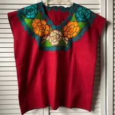 Embroidered Mexican Red Blouse, Size M Please See Photos For Measurements New Without Tags Red Bohemian Embroidered V-neck Top, Red V-neck Blouse With Floral Embroidery, Red Embroidered V-neck Blouse, Red Floral Embroidered Top, Red Sleeveless Tops With Floral Embroidery, Sleeveless Red Tops With Floral Embroidery, Red Sleeveless Top With Floral Embroidery, Red Short Sleeve Cotton Blouse, Red Folk Tops With Floral Embroidery