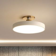 a modern ceiling light in a living room