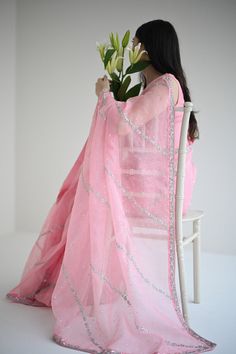 This beautiful stitched pure teapink organza saree is heavily embellished with silver hand craftmenship expertly done by our chosen artisans, taking upto 400+ hours, paired with a stitched pure raw silk blouse. Order Duration: 4 to 6 weeks Organza Saree, Raw Silk, Silk Blouse, Saree, Silk, Pure Products