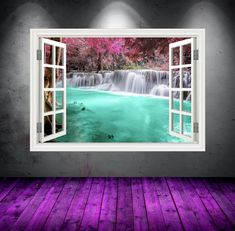 an open window with a view of a waterfall in the water and pink flowers on it