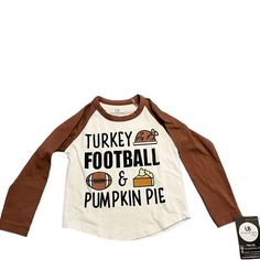 Turkey, Football, And Pumpkin Pie This Adorable 2t Shirt Is Perfect For A Girl Or Boy Unique Baby Shop Has The Cutest And Comfiest Clothes New With Tags Alice In Wonderland Shirts, Green Flannel Shirt, Turkey Football, Gap Sweatshirt, Green Flannel, Girls Graphic Tee, Tanktop Girl, Disney Shirt, Abercrombie Kids