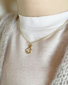 FREE SHIPPING, 14k yellow solid gold rabbit necklace. It can be produce 14k rose gold and white gold. DETAILS Chain is shown length approx. 40 cm (15 inch) and thickness is 1 mm (0.04 inch). The chain has a spring ring clasp. You may order a shorter or longer chain by leaving a note during checkout. Pendant height is approx. 1.5 cm (0.6 inch). MATERIALS All our jewelry are made of 14 karats solid gold. We like to use yellow gold, white gold and rose gold to please your color of choice. Use the d Minimalist Yellow Gold Flower Pendant Charm Necklace, Minimalist 14k Gold Necklace With Spring Ring Clasp, Minimalist 14k Gold Charm Necklaces With Lobster Clasp, Minimalist 14k Gold Charm Necklace With Lobster Clasp, 14k Gold Charm Necklace For Gift, Gift 14k Gold Charm Necklace With Spring Ring Clasp, Gold Rabbit, Bunny Jewelry, Rabbit Necklace