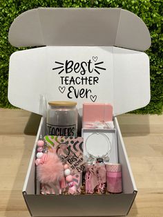 the best teacher ever gift box is packed with personal items