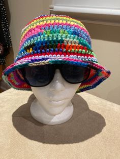 "Miu miu inspired style hand crocheted multicolor bucket hat Size:M-L Crown: 7.25\" Height: 8.5\" Width: 11\" Head circumference:22-25\" Great foldable bucket hat Material: cotton and acrylic yarns" Trendy Multicolor Crochet Hat One Size, Trendy Multicolor One-size Crochet Hat, Trendy Multicolor Bucket Hat, Multicolor Crochet Yarn Hat, Multicolor Knitted Bucket Hat, Multicolor Yarn Crochet Hat, Multicolor Crochet Beanie Hat, Multicolor Crochet Hat For Festival, One Size, Hand Knitted Multicolor Crochet Hat