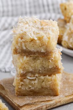 three coconut bars stacked on top of each other