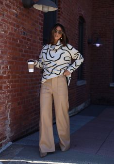 Our Oversized Abstract Sweater is the perfect blend of comfort and style. Crafted with a soft, stretchy knit and an abstract, patterned finish, this turtleneck sweater is not only unique, but provides a relaxed fit perfect for any brunch date, dinner out, or drinks with your closest friends. Trendy, versatile, and chic, you can dress it up or down, for a work look or for a casual outing. This sweater also makes a great statement piece for any wardrobe. Fabric 77% Acrylic, 22% Polyester, 4% Spand Casual Relaxed Fit Turtleneck For Fall, Trendy Oversized Soft Knit Turtleneck, Chic Oversized Long Sleeve Turtleneck, Oversized Turtleneck For Workwear In Fall, Oversized Turtleneck For Fall Workwear, Trendy Oversized Knit Turtleneck, Relaxed Fit Turtleneck For Fall Workwear, Chic High Neck Outerwear For Fall, Chic High Neck Fall Outerwear