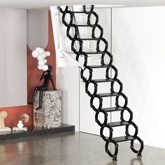 a staircase made out of metal links in a living room