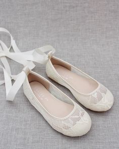 Chic and vintage lace ballerina flats with satin ribbon lace up. Great for flower girls, wedding party or any parties. We can also do this style with ankle strap only (separate listing coming soon). If your sizes are not available, please message us and we will help when sizes are available. DETAILS:COLORS AVAILABLE: Ivory, White, Blush, Navy and Pink satinUPPER: Synthetic upper and liningMATERIALS: Mandmade outsoleORIGIN: Imported STYLE NAME: ZOE Christening Shoes, Lace Up Ballet Flats, Flower Girl Shoes, Lace Flats, Wedding Shoes Flats, Girls Flats, Girl Shoes, Ballerina Flats, Flower Girls