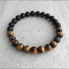 Beautiful Beaded Bracelet Made With 8mm Brown Tiger Eye And Matt Onyx Protection - Focus - Courage - Grounding - Cleansing - Harmony A Gift For Men & Women Casual Black Stretch Bracelet With Gemstone Beads, Casual Black Hand-strung Beads, Casual Black Beaded Bracelets With Natural Stones, Black Bracelets With Natural Stones For Everyday, Casual Black Beaded Bracelets With 8mm Beads, Black Gemstone Beaded Bracelets, Casual Brown Bracelet With Black Beads, Everyday Black Gemstone Beaded Bracelets, Casual Brown Bracelets With Black Beads