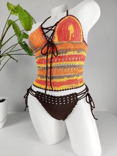 🏖️ Dive into summer with our exquisitely handcrafted crochet bikini set, made from high-quality acrylic yarn. This unique, bohemian-style swimwear offers the perfect blend of comfort and style, making it ideal for beach outings, pool parties, and tropical vacations. Each piece is carefully designed to provide a flattering fit, ensuring you feel confident and chic wherever you go. * Material: 100% soft acrylic yarn for durability and comfort. * Design: Elegant crochet pattern with adjustable str Beachwear Crochet Swimwear For Vacation, Crochet Beachwear Swimwear For Vacation, Crochet Swimwear For Beachwear Vacation, Crochet Swimwear For Poolside Vacation, Multicolor Crochet Swimwear For Summer, Crochet Swimwear For Beach Season Vacation, Crochet Festival Beachwear Swimwear, Summer Crochet Lace Swimwear, Crochet Tie-side Swimwear For Vacation