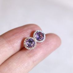 "These stylish earrings have a stunning bright color and the Amethyst is surrounded by a halo of shimmering diamonds. Perfect as a gift for yourself, your girlfriend or wife, or your mother. Features * Made to Order. * Metal: 925 Sterling Silver * Custom Color: Silver, Gold, Rose Gold * Main Stone: Amethyst, 5mm dia Round Shape, 2pcs * Side Stone: Cubic Zirconia Amethyst Ring: * Halo Ring: https://etsy.me/32kkc68 * Bypassing: https://etsy.me/32u2NIF Be sure to hit \"favorite\" on the right so it Fine Jewelry Purple Halo Jewelry, Purple Halo Jewelry As A Gift, Tanzanite Round Earrings As Gifts, Round Amethyst Gemstones With Halo Setting, Tanzanite Birthstone Earrings As Gift, Tanzanite Birthstone Earrings For Gifts, Round Tanzanite Earrings For Gifts, Round Tanzanite Earrings Gift, Amethyst Gemstones With Halo Setting