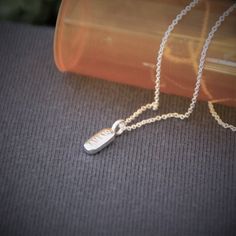 Ambien pill necklace / sterling silver / medicine / medical / pharmacy tech / nursing school / sleep Sterling Silver Stamped Necklace With Rectangular Pendant, Hand Stamped Rectangular Pendant Necklace In Sterling Silver, Sterling Silver Oval Pendant Necklace, Silver Oblong Necklaces For Gifts, Silver Oblong Necklace For Gift, Minimalist Silver Dog Tag Charm Necklace, Sterling Silver Stamped Dog Tag Necklace, Sterling Silver Dog Tag Necklace, Sterling Silver Dog Tag Necklace Stamped