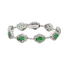 5.77 carats Round Diamonds 2.05 carats Round Green Tsavorite Garnet Bracelet Set in 18K White Gold Bracelet Length 6.75 inches Tsavorite Jewelry, Emerald Bracelet, Tsavorite Garnet, Garnet Bracelet, White Gold Bracelet, Pandora Bracelets, Dream Jewelry, Pave Diamonds, Bracelet Set