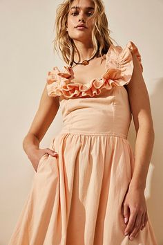 Effortlessly ethereal, this sweet midi from our free-est collection is the perfect romantic look. **Fit:** A-line silhouette with slim fit bodice **Features:** Exaggerated ruffled square neckline, billowy skirt design, tie-back closure **Why We | Ruffle It Up Midi Dress by free-est at Free People in Pink, Size: L Bridesmaid Midi Dress With Sweetheart Neckline And Ruffles, Feminine Bridesmaid Midi Dress With Ruffles, Flirty Midi Dress With Ruffles And Fitted Bodice, Flirty Midi Dress With Ruffled Fitted Bodice, Spring Midi Dress With Sweetheart Neckline And Ruffle Hem, Feminine Bridesmaid Dresses With Ruffled Straps, Feminine Midi Dress With Ruffle Hem For Garden Party, Spring Bridesmaid Midi Dress With Ruffle Hem, Bridesmaid Midi Dress With Ruffles