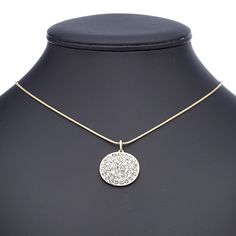 Shine on while wearing this rhinestone-studded necklace. The glitter of gold finish and eye-catching bling of clear faceted glass combine on a round pendant to produce a rich appearance without an expensive price tag. Gold Crystal Pendant Chain Necklace, Metal Coin Necklace With Round Pendant, Gold Bling Pendant Necklace, Gold Pendant Chain Necklace With Bling, Gold Chain Necklace With Bling Pendant, Metal Pendant Jewelry With Rhinestones, Gold Crystal Necklace With Adjustable Chain, Silver Rhinestone Necklace Gold Plated As Gift, Gold Metal Coin Necklace With Round Pendant