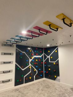 an indoor climbing wall in a building