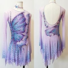 a purple and blue figure skating dress with sequins on the bottom, front and back