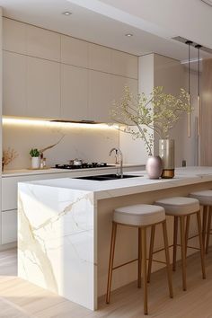 a kitchen with marble counter tops and stools next to an island in the middle