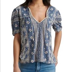 Lucky Brand Blue Floral Print Short Sleeve Cotton Top With Tie Accent Size Small Blue Pink And White Cotton Blend Machine Washable New With Tags Blue Bohemian Cotton Tops, Blue Cotton Bohemian Tops, Bohemian Blue Tops With Relaxed Fit, Blue Bohemian Relaxed Fit Tops, Bohemian Blue Cotton Tops, Bohemian Blue Relaxed Fit Tops, Blue Short Sleeve Blouse With Relaxed Fit, Blue Bohemian Short Sleeve Tops, Blue Relaxed Fit Short Sleeve Blouse