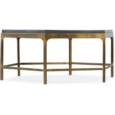 a black and gold console table on white background