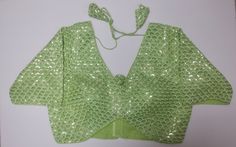 *Pista green, Jorjet fabric sequins work blouse *Mid-length Sleeves  *Readymade Blouse *Sizing:  Bust 39, under bust 32inches  *Please message us for size customization options *Color May Vary Slightly From Picture  *Our store is located in Los Angeles Bollywood Style Pista Green Sequined Sets, Festive Pista Green Sequined Choli, Pista Green Blouse With Resham Embroidery For Reception, Bollywood Style Pista Green Sequined Lehenga, Pista Green Cutdana Party Choli, Festive Pista Green Lehenga With Sequins, Green Anarkali With Sequins, Festive Pista Green Sequined Lehenga, Festive Semi-stitched Pista Green Blouse