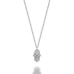 14kt gold diamond hamsa pendant. Available in white and yellow gold. A perfect piece to wear on its own or layer with another necklace. Product: Necklace Material: 14kt Gold Gemstone: White Diamond Diamond Gemstone Carat: 0.09cts Gemstone Shape: Round Hamsa Pendant, 14kt Gold, Diamond Gemstone, White Diamond, Gold Diamond, Diamonds, Fashion Accessories, Yellow Gold, Gemstones