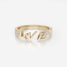 Created to be worn with other beauties or on its own, it will serve you remarkably anyway. This adorable ring with the engraved word LOVE is absolutely optimizing. This amiable ring is made to incite the hidden love inside you. Appreciate yourself and Love yourself with this bewitching ring. Adorned with 10 sparkly gemstones expertly, the total carat weight of this ring is 0.08. The flawless stone color is VS+, and the stone clarity is FG+. The alluring metal types of this band ring are 14K gold and 18K gold infused with high quality. The item weight of 14K gold is 3,265 G, and the item weight of 18 K gold is 3,865 G is perfectly bright. The total item length is 1 MM, and the item width is 2 MM. Promise Initial Ring In White Gold, 14k Gold Diamond Promise Ring, White Gold Open Initial Ring For Promise, Fine Jewelry Engraved Open Band Promise Ring, 14k Gold Initial Ring With Diamond Accents For Wedding, 14k Gold Wedding Initial Ring With Diamond Accents, Anniversary Fine Jewelry Initial Ring With Round Cut, Engraved Diamond Initial Ring For Wedding, Promise White Gold Initial Ring In 14k