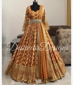 Made to Order/Measurement/Custom Order Lehenga - Color : orange brown - Fabric : Pure Silk - Fully flared paneled lehenga -   Pure Banarasi  Silk -   Attached  Dupatta with Blouse - Drawstring closure with Tassels - - It can be customize in any design or size  PLEASE NOTE: BUYERS ARE RESPONSIBLE FOR ANY CUSTOMS AND IMPORT TAXES THAT MAY APPLY. This is a made to order product. If you opt for 'Made To Measurement Option', we will provide a measurement template and you can share the measurements li Designer Orange Sharara With Traditional Drape, Designer Orange Sharara With Zari Work, Orange Salwar Kameez With Cutdana For Navratri, Semi-stitched Orange Cutdana Anarkali Set, Designer Orange Anarkali Set For Diwali, Designer Orange Sharara For Navratri, Orange Semi-stitched Salwar Kameez With Cutdana, Orange Traditional Drape Set With Cutdana, Orange Anarkali Set For Diwali