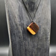 "Prices given are total prices. VAT is not shown due to small business status according to § 19 UStG." A charming pendant, with a leather or cotton cord chain. For this absolutely natural and beautiful pendant, I used a piece of fine real wood that grew in two colors. The wood is natural and not stained, has been painstakingly sanded and polished by hand. This is the perfect piece of jewelry for all nature lovers. YOU CAN NOW ALSO HAVE THIS PENDANT PERSONALIZED WITH AN ENGRAVING TO MAKE YOUR JEW Handmade Unique Pendant Charm Necklaces, Unique Handmade Pendant Charm Necklaces, Unique Handmade Charm Necklaces With Pendant, Handmade Small Charm Necklaces As Gift, Handmade Small Charm Necklace For Gift, Small Handmade Charm Necklace For Gift, Unique Handmade Charm Necklace For Gift, Unique Personalized Round Pendant Necklaces, Distinctive Handmade Charm Necklaces As Gifts